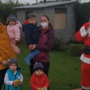 Visita de Papá Noel ás casas niño de Frades